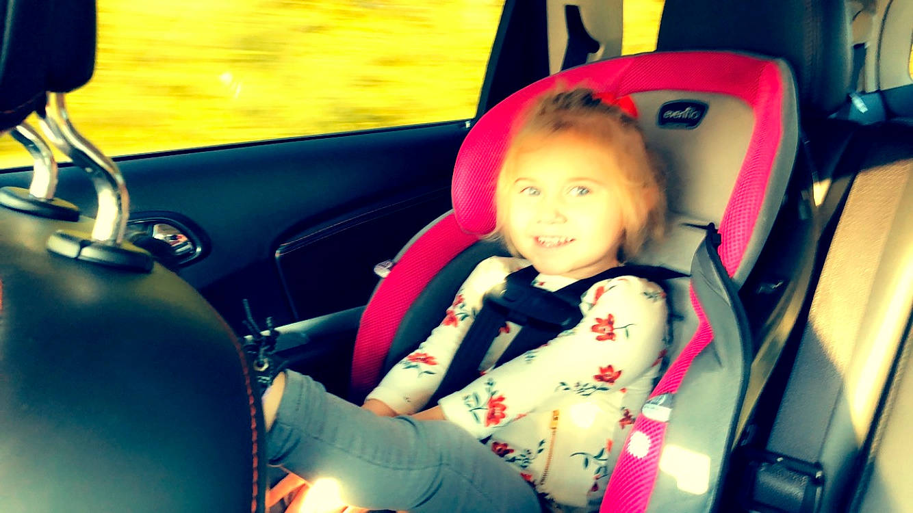 Aubri joined the competition — help win amazing prizes! auto_part, baby, baby_in_car_seat, car, car_seat, car_seat_cover, child, city_car, cool, driving, family_car, fun, joy, person, product, seat_belt, smile, steering_part, steering_wheel, toddler