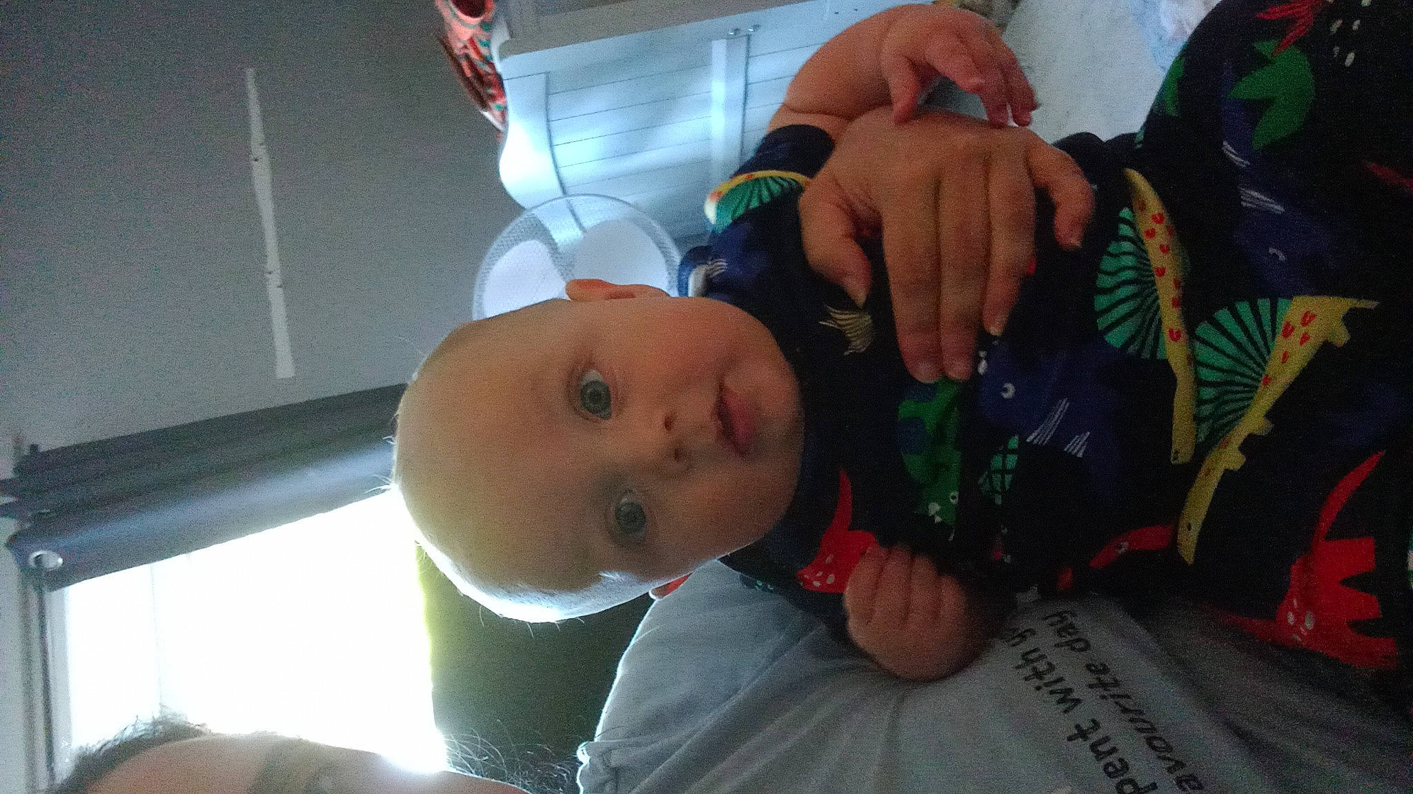 Judson joined the competition — help win amazing prizes! baby, child, event, eyewear, finger, fun, hat, mouth, nail, nose, person, personal_protective_equipment, plant, room, sitting, sunglasses, surprise, thumb, toddler, tree