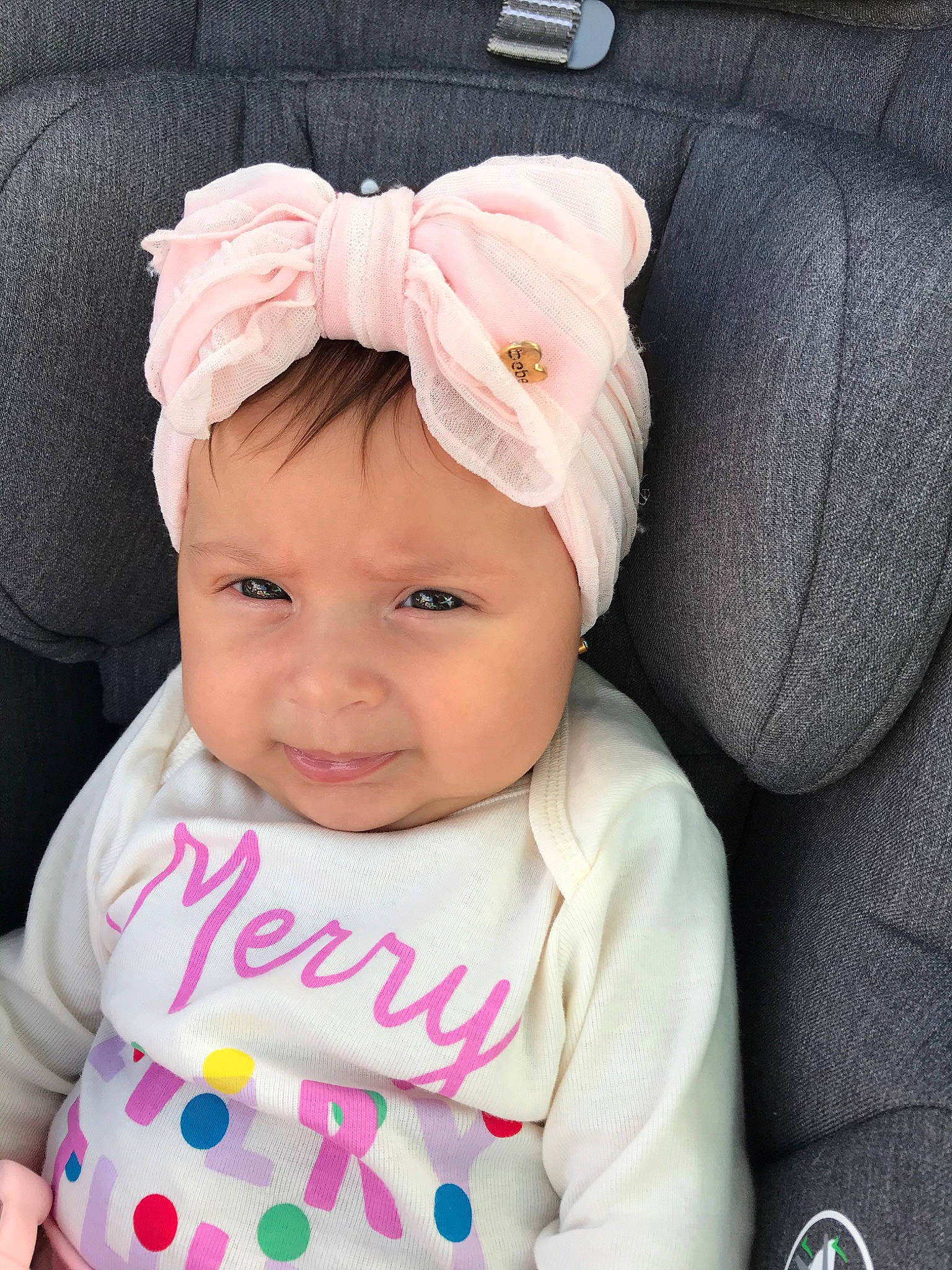 Aliana is registered to the contest to win money with this photo: baby, baby_toddler_clothing, cheek, child, cool, ear, fashion_accessory, hair_accessory, head, headband, headgear, person, pink, product, skin, smile, toddler