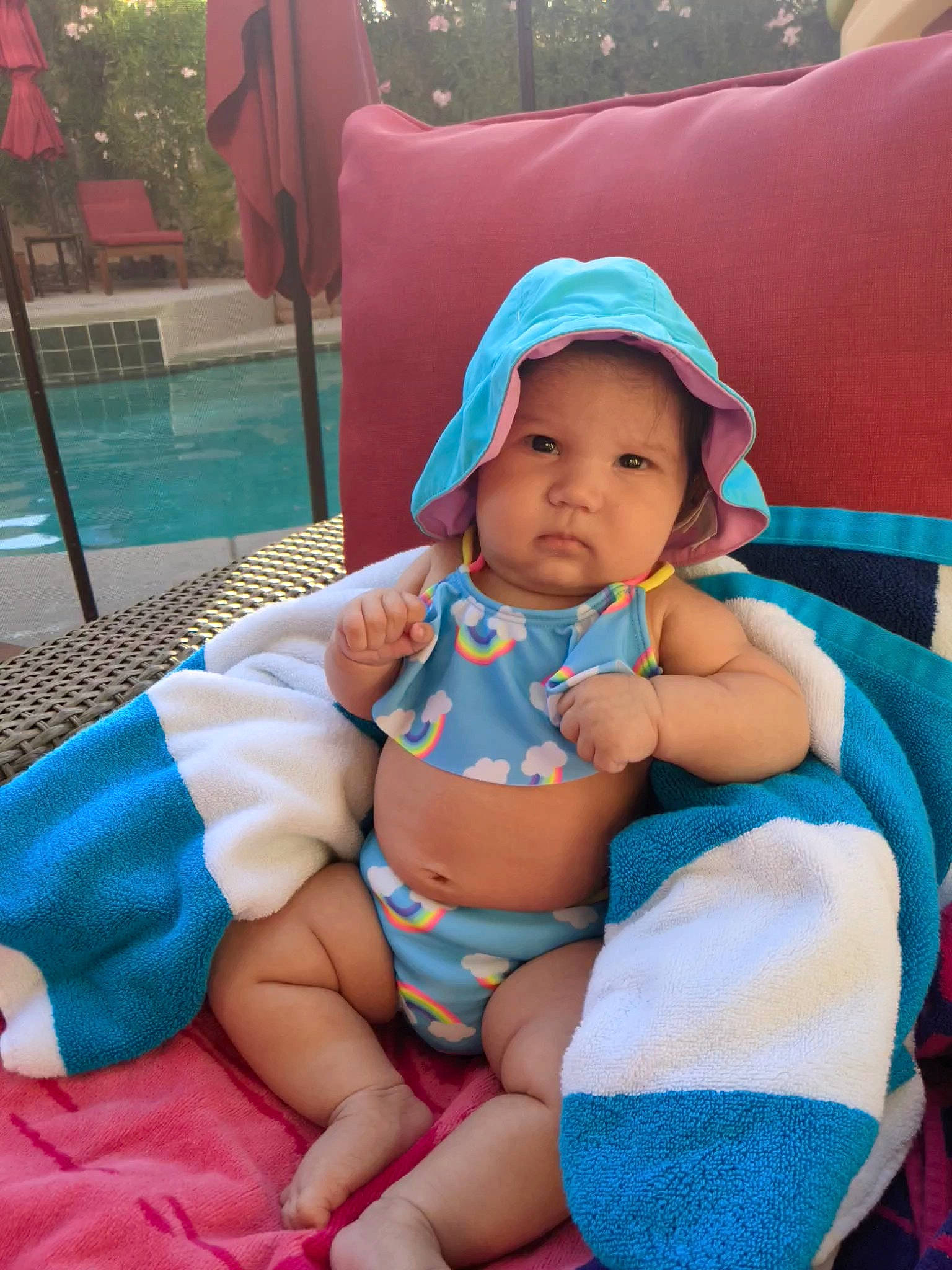 Stevie Rose is registered to the contest to win money with this photo: abdomen, baby, baby_toddler_clothing, chair, child, comfort, face, fun, hairstyle, happy, headwear, lap, leg, leisure, mouth, person, pink, skin, summer, thigh