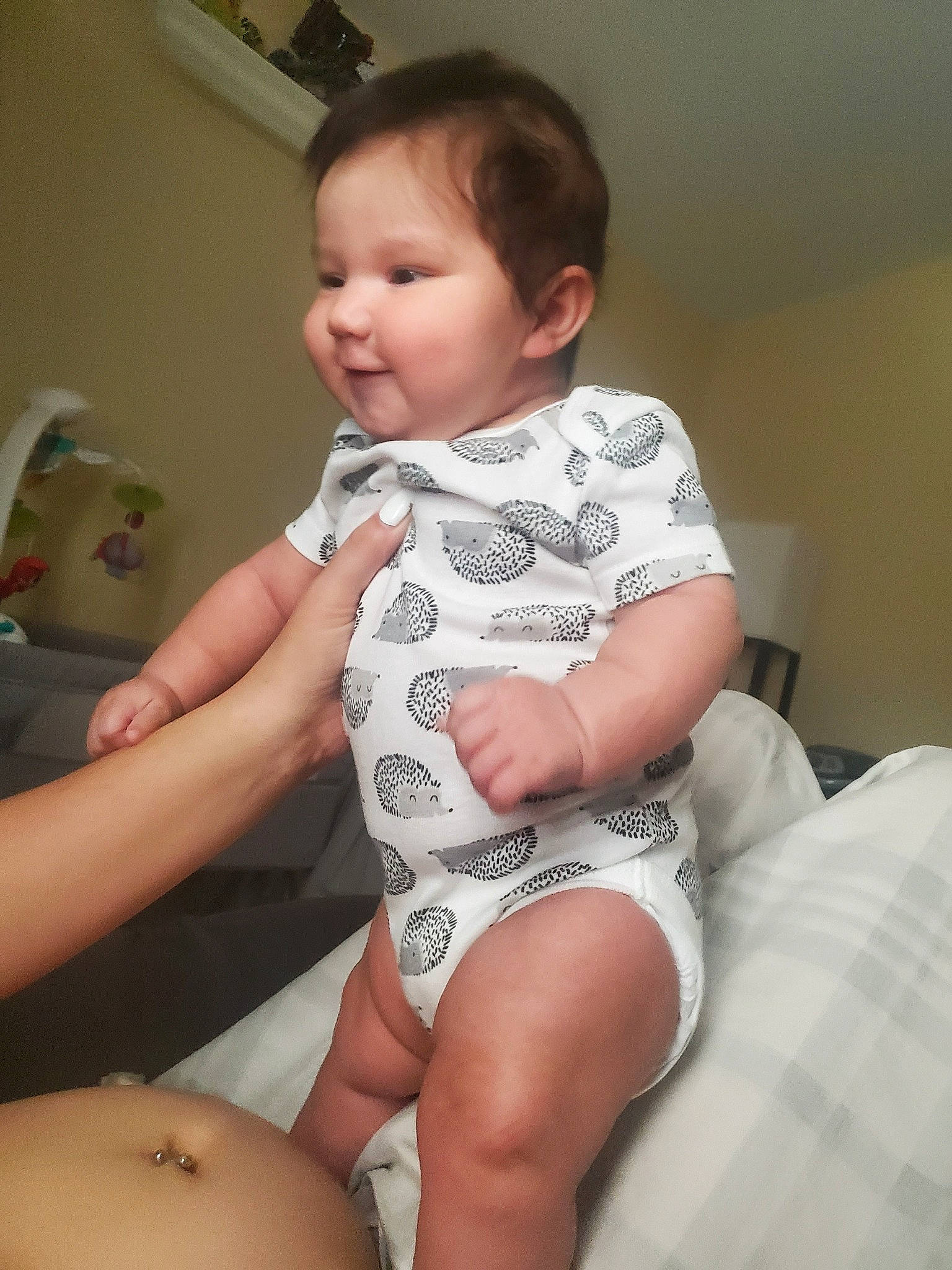 Stevie Rose is registered to the contest to win money with this photo: arm, baby_toddler_clothing, cheek, chin, comfort, eye, hand, head, human_body, iris, joint, leg, mouth, muscle, neck, person, skin, sleeve, smile, stomach
