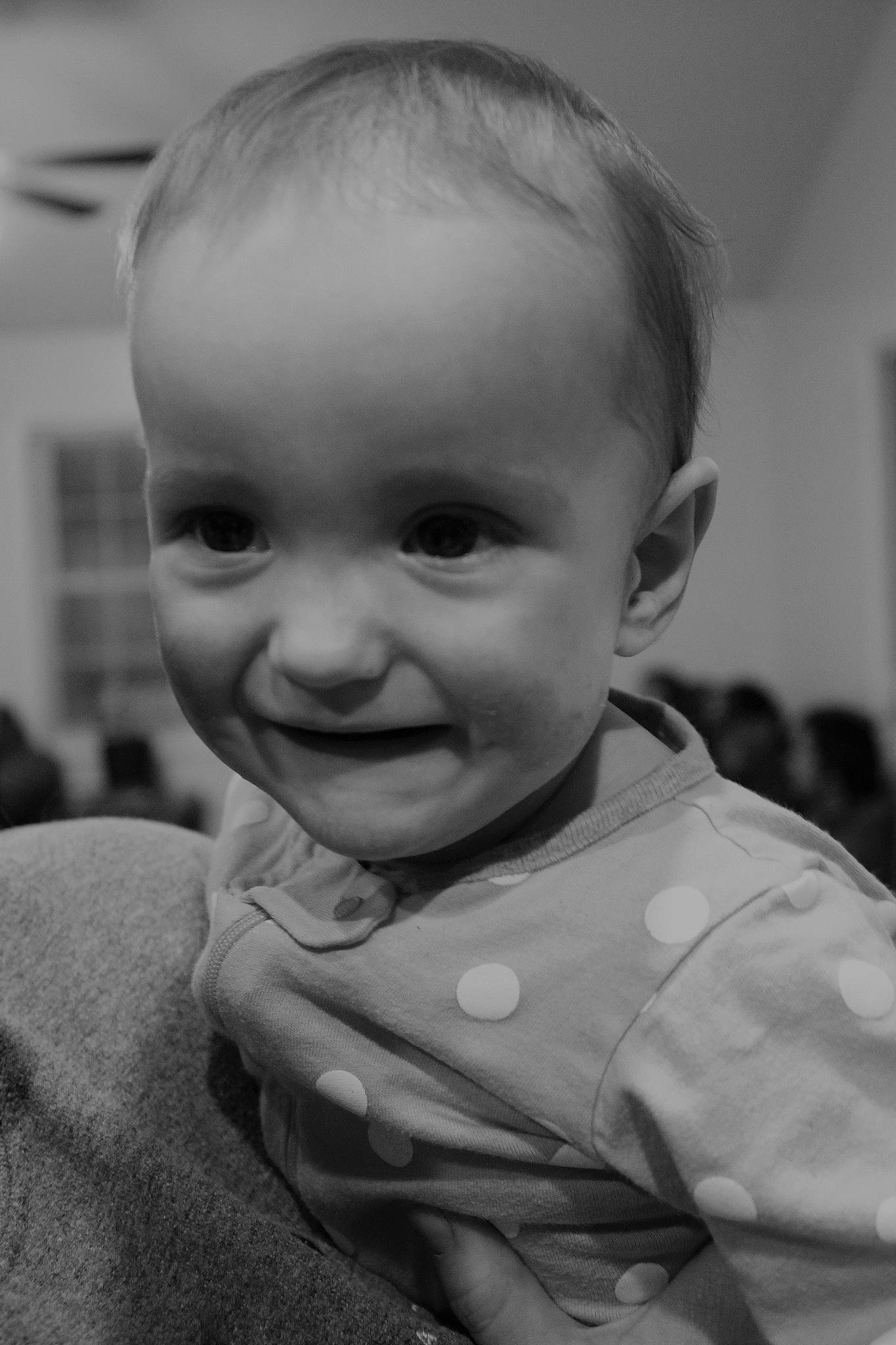 Delaney joined the competition — help win amazing prizes! baby, baby_toddler_clothing, black_and_white, cheek, child, fun, gesture, grey, happy, iris, joy, monochrome, monochrome_photography, mouth, nose, person, sitting, skin, sleeve, smile