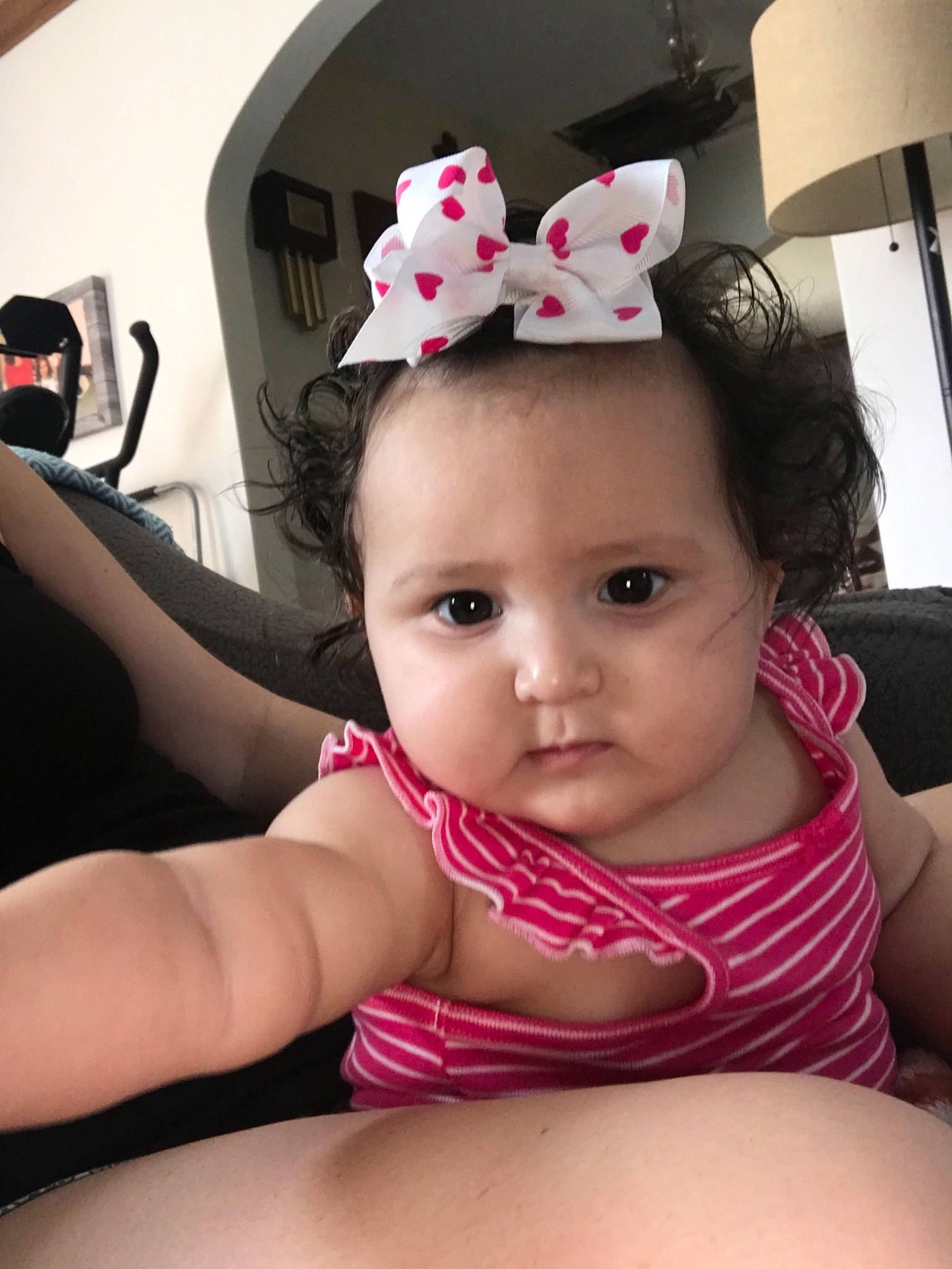 Alaya is registered to the contest to win money with this photo: arm, baby, cheek, chest, child, daughter, finger, hair_accessory, headgear, leg, nail, person, pink, skin, thigh, toddler