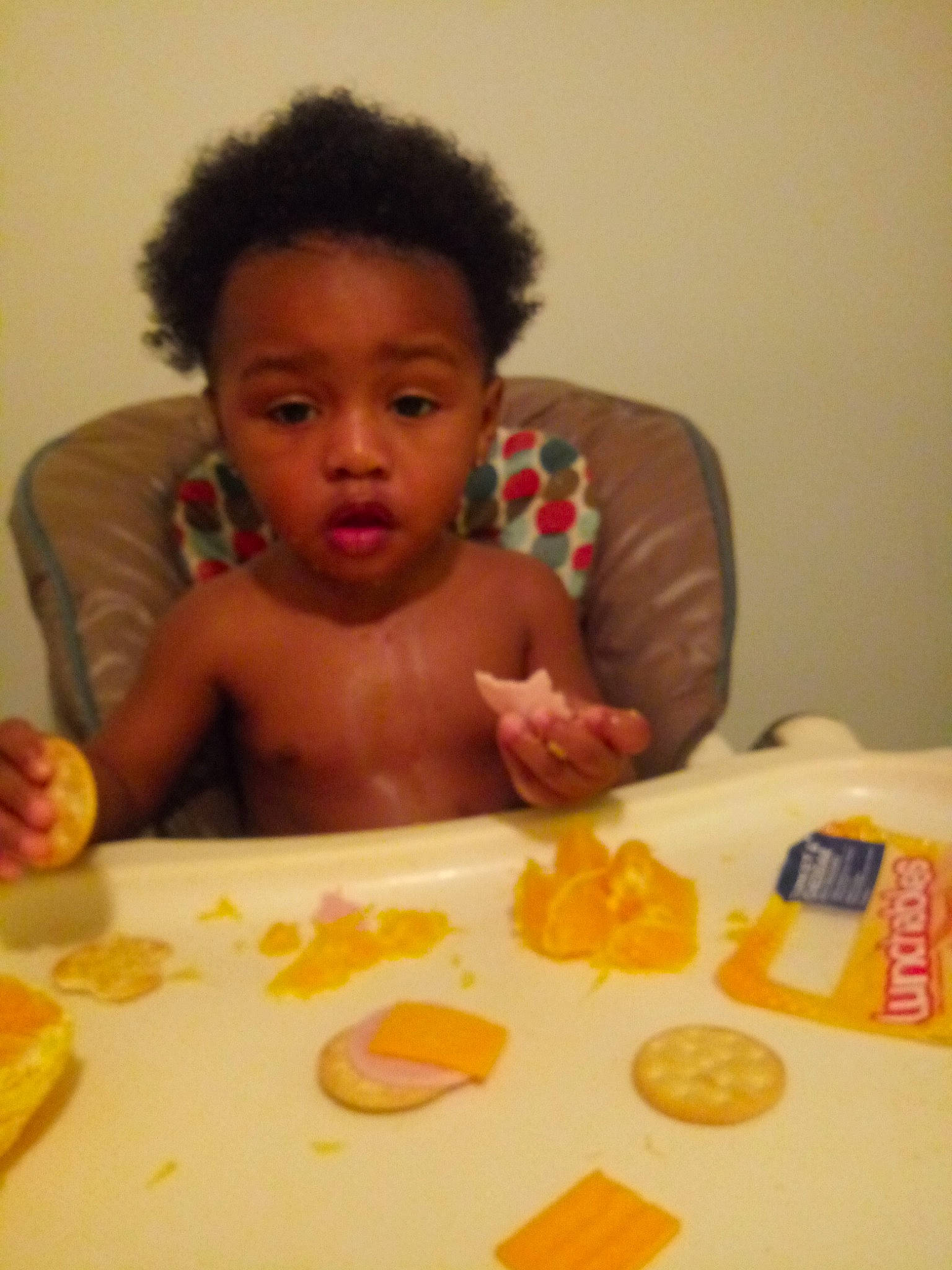 Jermaine Jr is registered to the contest to win money with this photo: baby, child, eating, food, person, play, surprise, sweetness, toddler