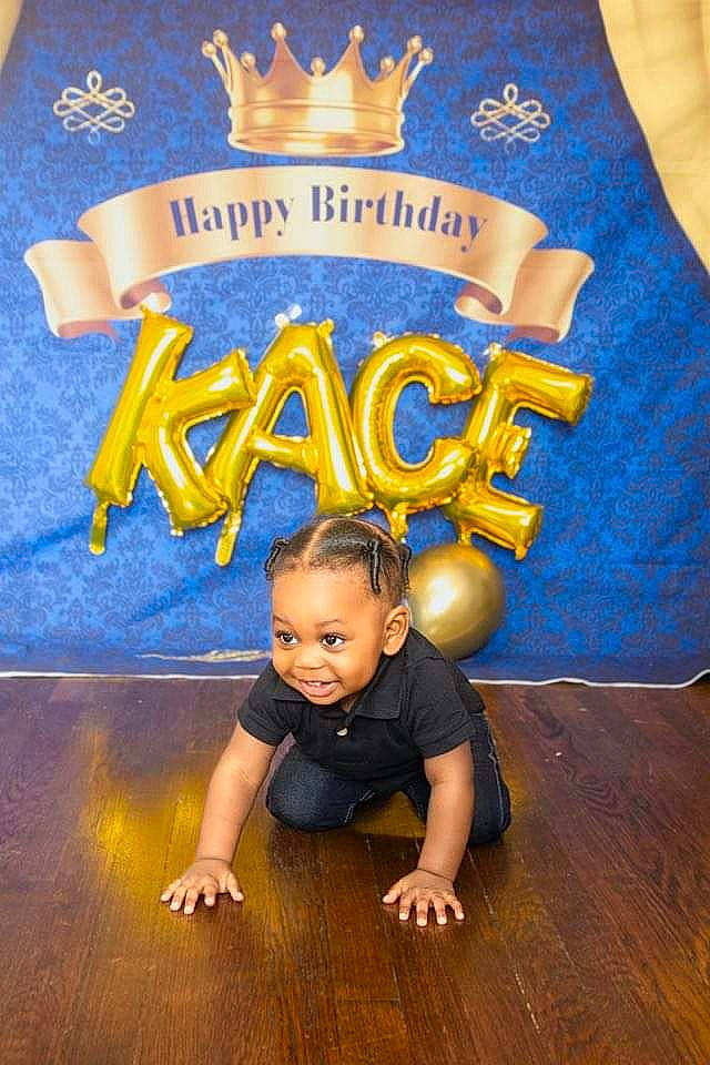 Kace is registered to the contest to win money with this photo: baby, baby_toddler_clothing, blue, child, electric_blue, event, flash_photography, flooring, font, fun, happy, hardwood, jersey, logo, person, sleeve, t_shirt, toddler, white, wood
