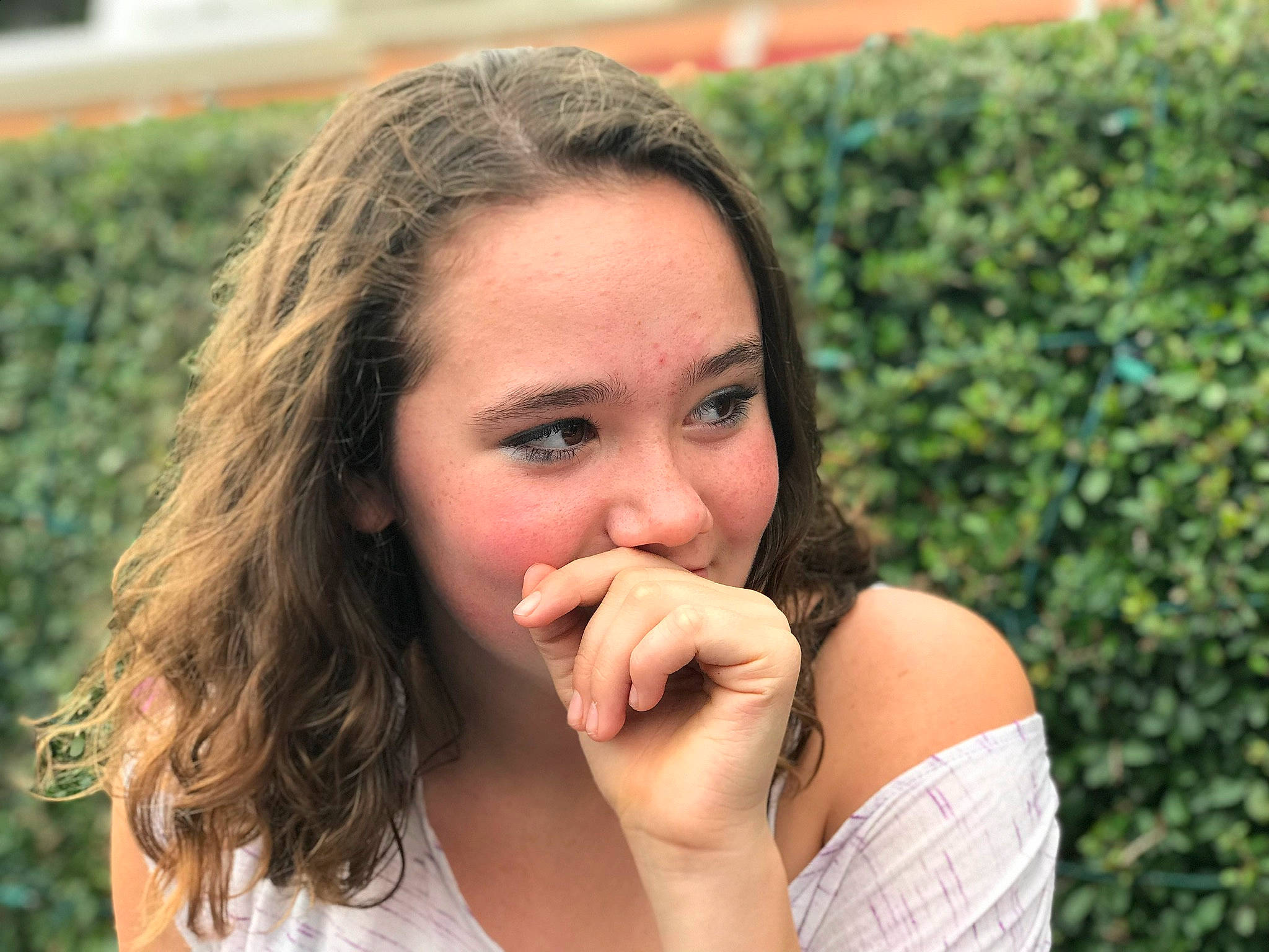 Kayleigh is registered to the contest to win money with this photo: beard, black_hair, chin, close_up, eyebrow, eyelash, finger, gesture, grass, happy, leisure, lip, long_hair, mouth, nail, neck, nose, people_in_nature, person, skin