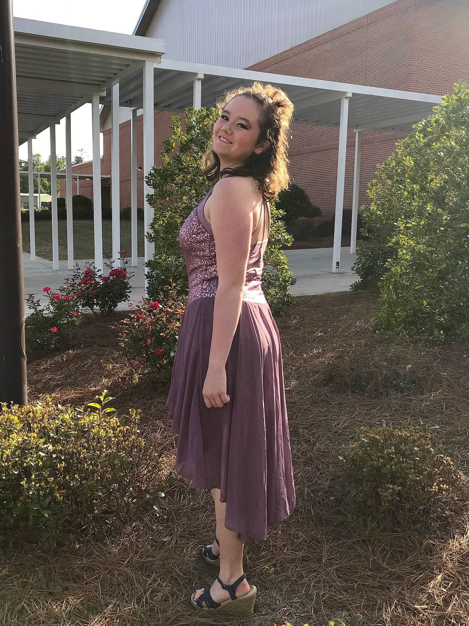 Kayleigh is registered to the contest to win money with this photo: arm, bridal_party_dress, day_dress, dress, eyewear, fashion_design, fawn, flash_photography, formal_wear, gown, grass, human_body, joy, neck, one_piece_garment, outerwear, person, plant, sleeve, strapless_dress