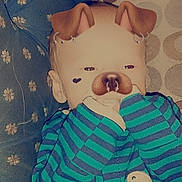 Elijah is registered to the contest to win money with this photo: baby, baby_products, baby_toddler_clothing, baby_toys, cheek, child, doll, fictional_character, happy, head, pattern, plush, room, skin, sleeve, stuffed_toy, t_shirt, toy, vintage_clothing