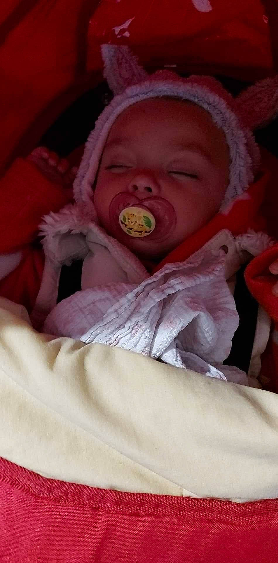 Mia joined the competition — help win amazing prizes! baby, baby_products, baby_sleeping, baby_toddler_clothing, blanket, bonnet, cheek, child, comfort, human, linens, lip, person, pink, skin, textile, toddler, tongue