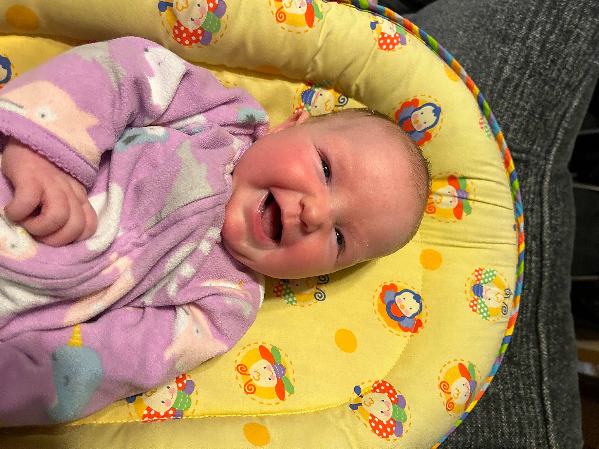 Lila is registered to the contest to win money with this photo: baby, baby_products, baby_safety, baby_toddler_clothing, bedtime, cheek, child, comfort, eye, face, fun, happy, infant_bed, iris, linens, person, product, room, skin, smile