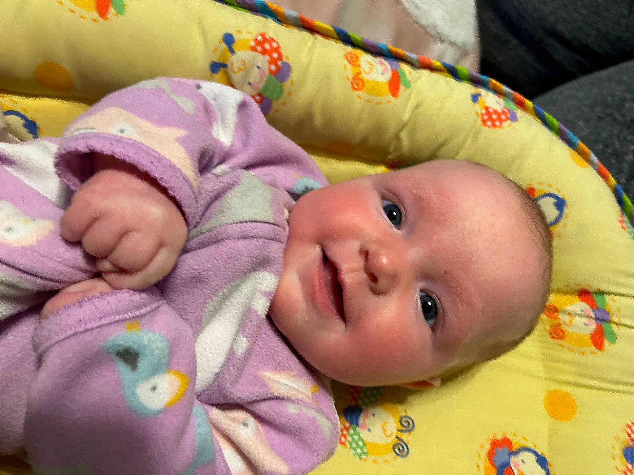 Lila is registered to the contest to win money with this photo: baby, baby_products, baby_toddler_clothing, baby_toys, bedtime, cheek, child, comfort, happy, head, linens, nose, person, pink, product, room, skin, smile, textile, toddler