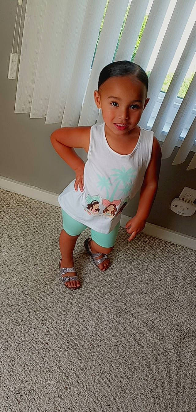 Aliyanna joined the competition — help win amazing prizes! baby_toddler_clothing, calf, child, elbow, flip_flops, floor, flooring, foot, happy, human_leg, joy, knee, leg, person, sandal, shoe, shorts, sleeve, sneakers, t_shirt