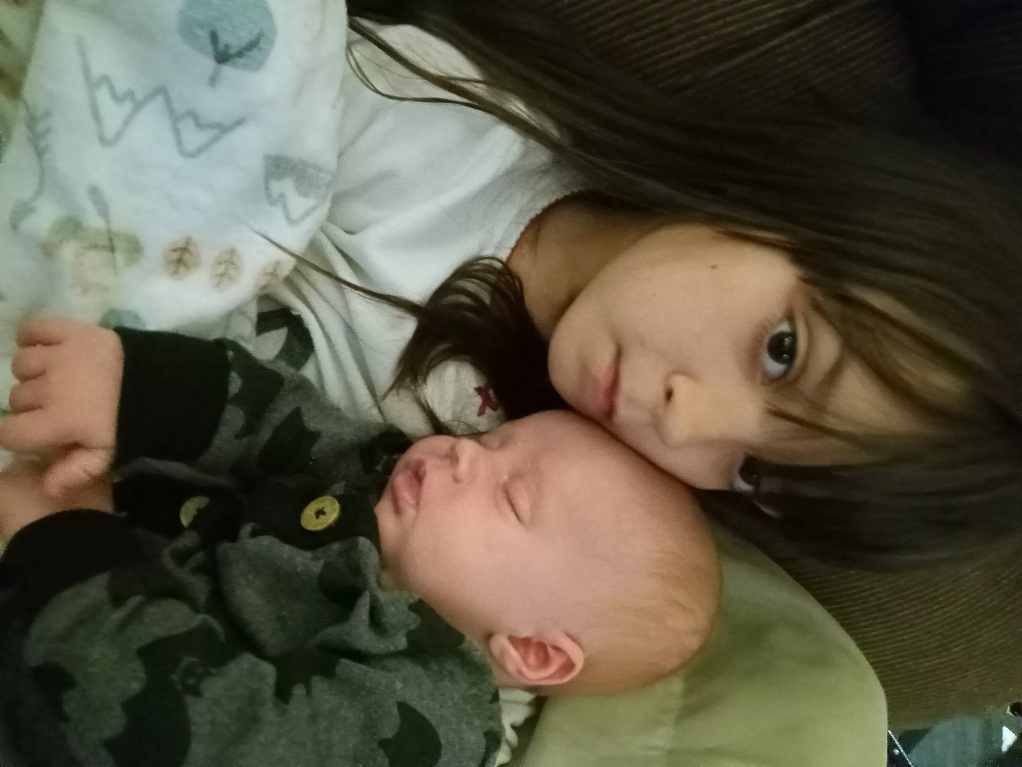 Alyssa is registered to the contest to win money with this photo: baby, baby_toddler_clothing, cheek, child, comfort, eyelash, facial_expression, finger, gesture, grass, head, iris, mammal, mouth, nose, organ, pattern, person, skin, toddler