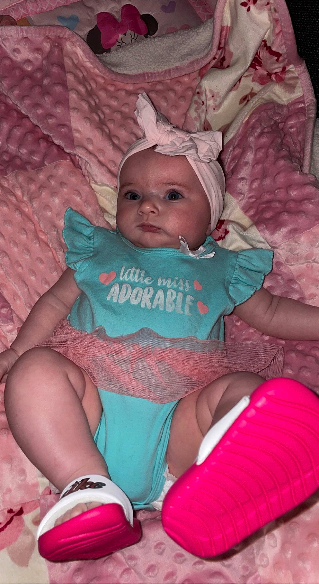 Evelynn joined the competition — help win amazing prizes! arm, baby, baby_toddler_clothing, child, comfort, facial_expression, finger, fun, happy, headwear, human_body, iris, lap, leg, magenta, mouth, person, pink, purple, skin