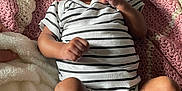 Nakiea is registered to the contest to win money with this photo: baby, infant, striped_clothing, crocheted_blanket, fist, onesie, bottle, denim_shorts, blanket, lying_down, person, skin, cute, newborn, cozy, indoor, soft_texture, sleepy, small_child, relaxed