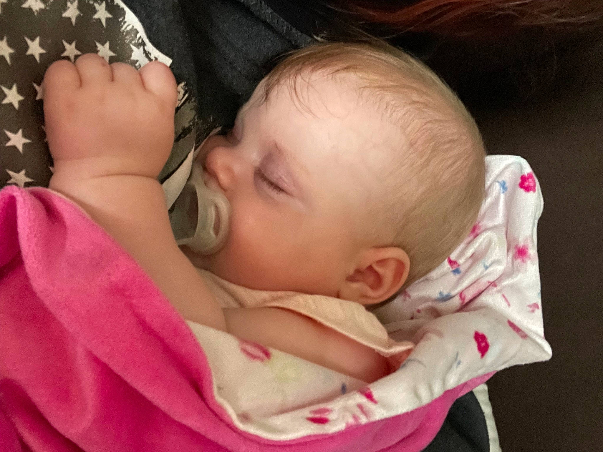 Everleigh is registered to the contest to win money with this photo: baby, baby_toddler_clothing, cheek, child, chin, close_up, comfort, eyelash, gesture, happy, lip, mammal, mouth, nail, nose, person, pink, skin, sleeve, thumb