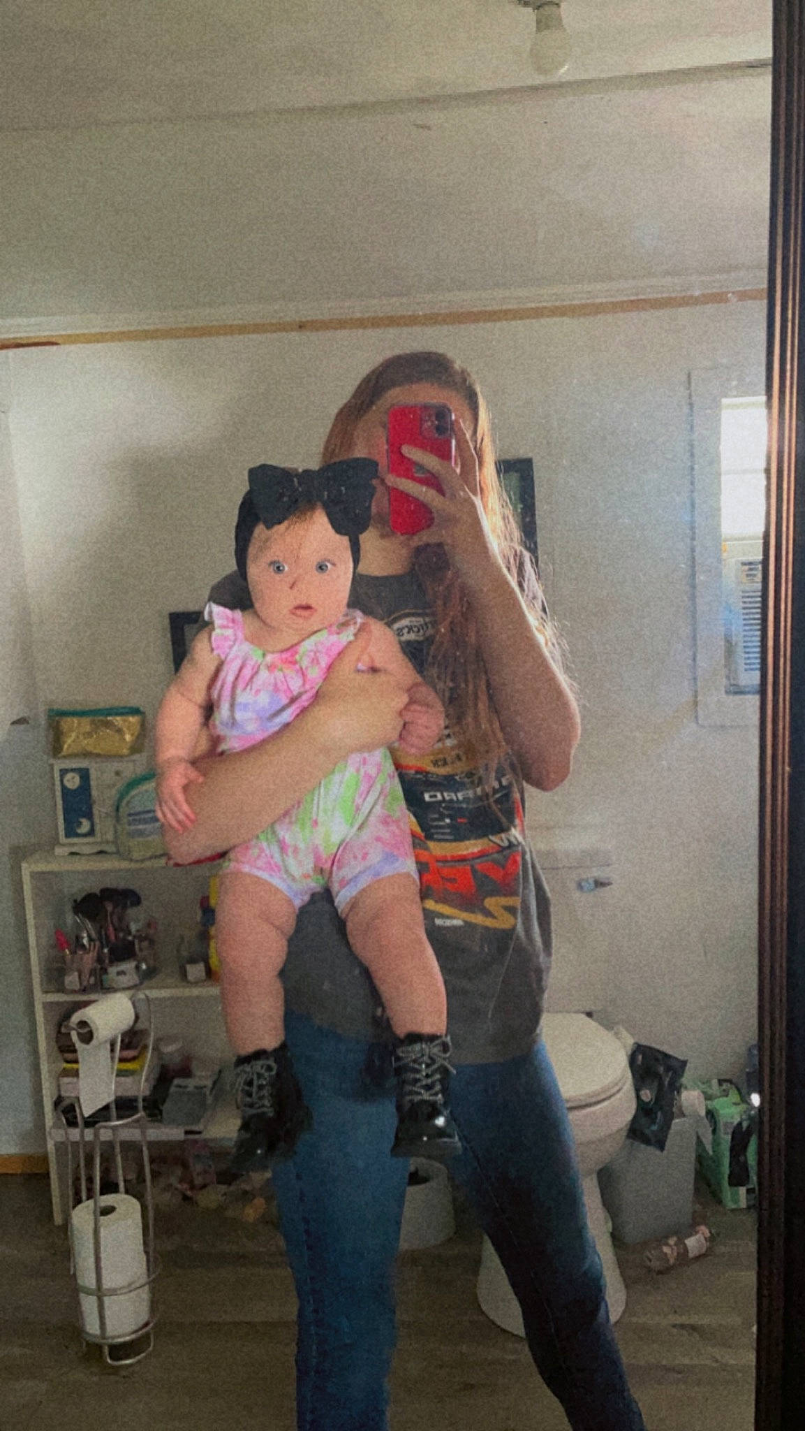 Everleigh is registered to the contest to win money with this photo: abdomen, baby, chest, child, elbow, finger, fun, hair, happy, head, human_leg, jeans, knee, leg, person, shorts, t_shirt, thigh, thumb, toddler