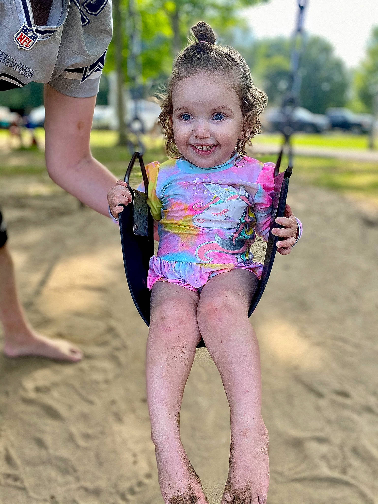 Thea Bean is registered to the contest to win money with this photo: face, facial_expression, finger, gesture, hairstyle, hand, happy, human_body, joint, joy, leg, people_in_nature, people_on_beach, person, pink, sleeve, smile, summer, t_shirt, thigh
