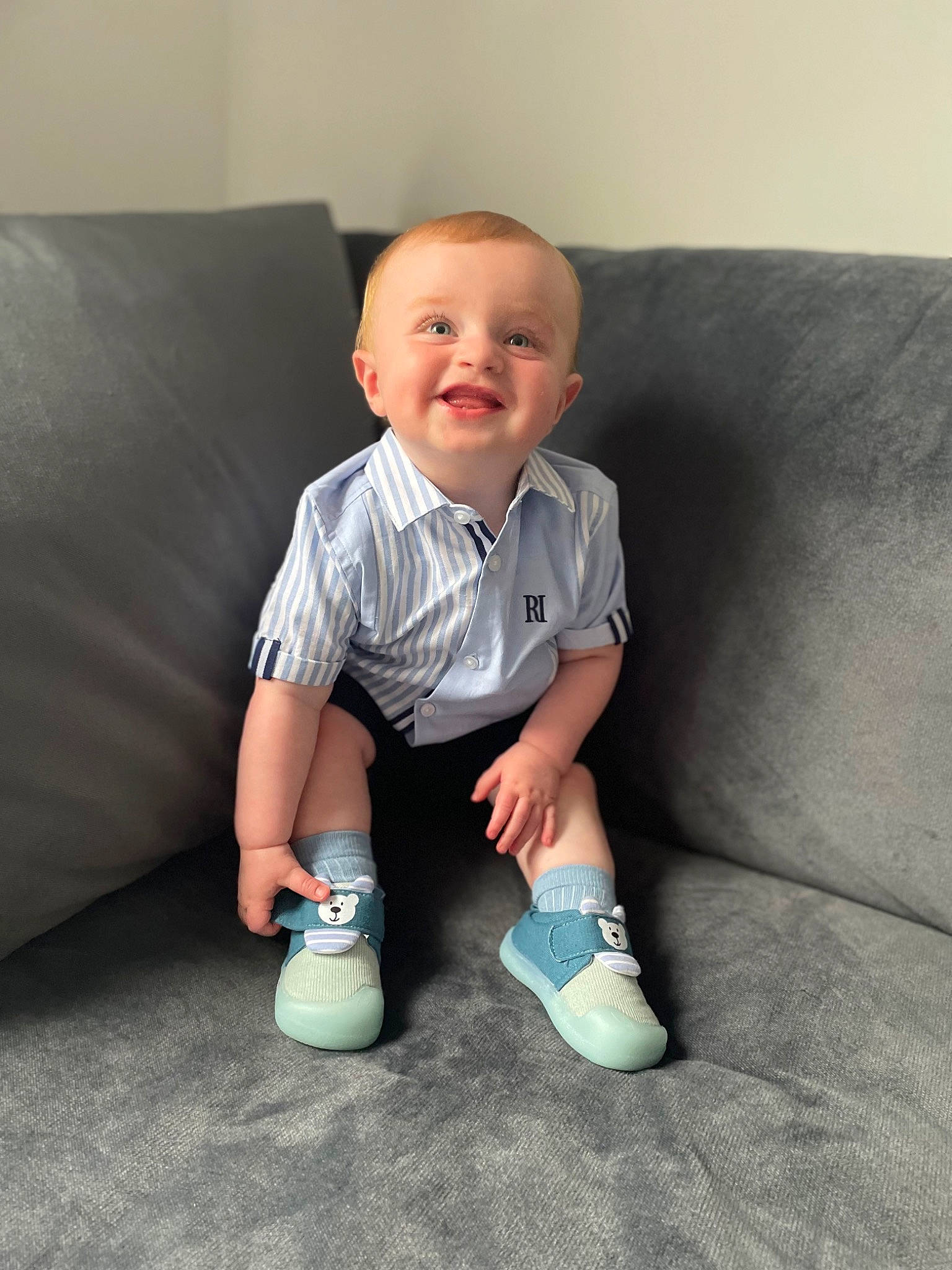 Brodie joined the competition — help win amazing prizes! baby, baby_toddler_clothing, comfort, couch, electric_blue, flash_photography, flooring, hairstyle, happy, human_leg, joy, knee, leg, person, product, sitting, skin, sleeve, smile, sock