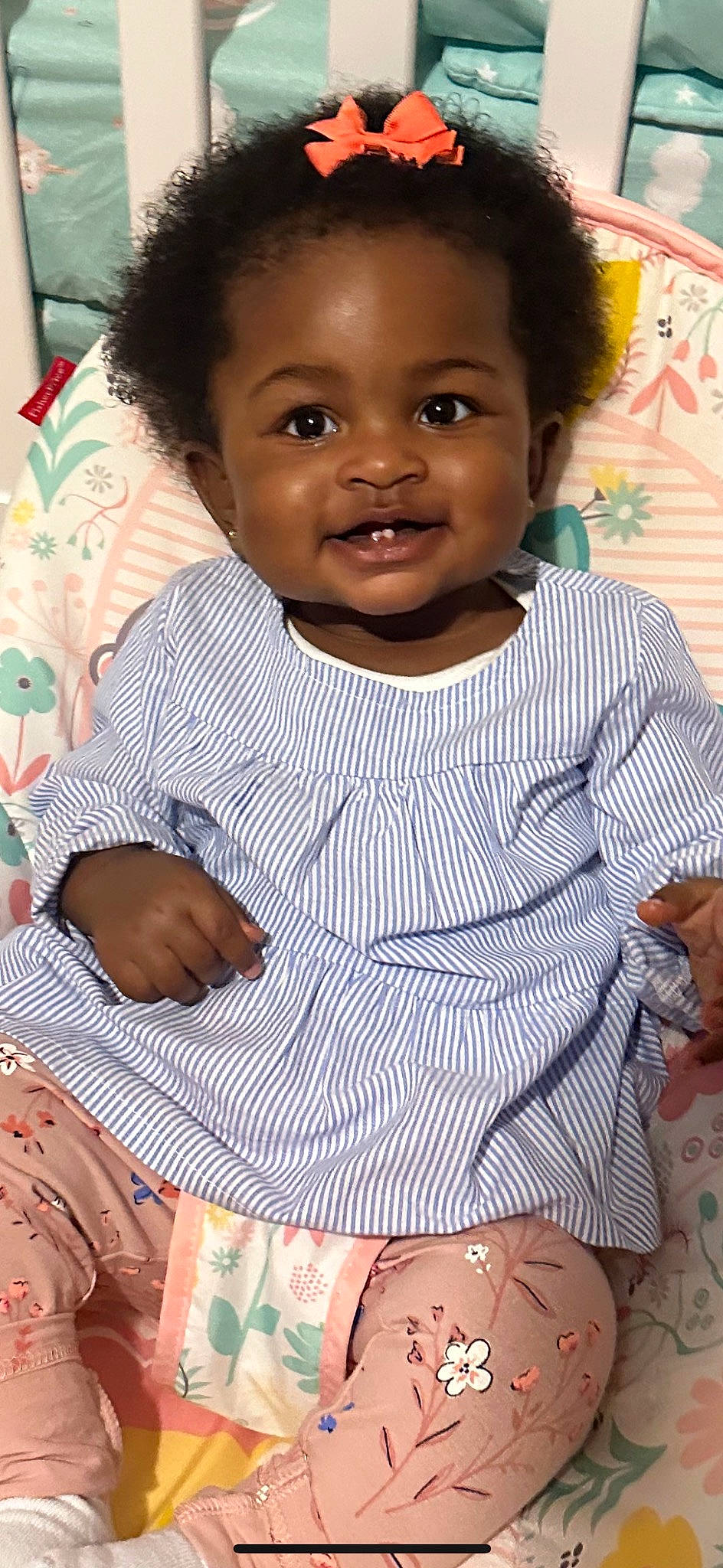 Malia is registered to the contest to win money with this photo: black, cheek, child, chin, eye, face, forehead, hair, hairstyle, happy, head, human, joy, lip, nose, organ, person, skin, sleeve, smile