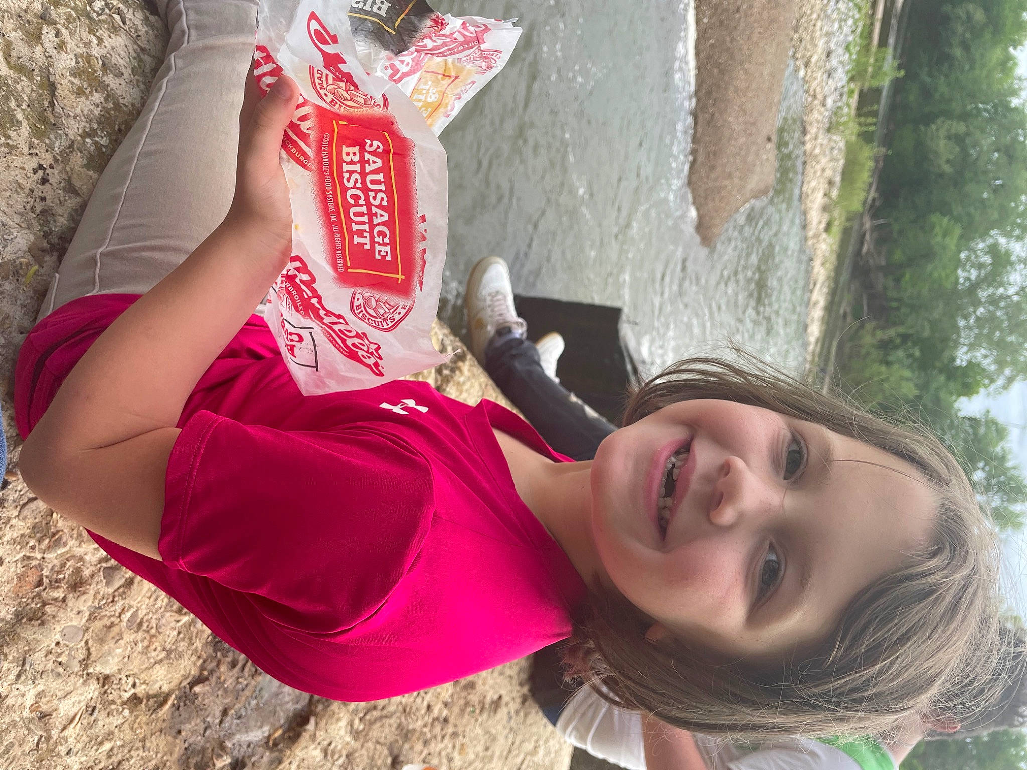 Vernyn is registered to the contest to win money with this photo: beauty, blond, child, eyewear, facial_expression, fun, grass, hairstyle, happy, human_leg, joy, leisure, magenta, person, pink, plant, skin, smile, summer, t_shirt