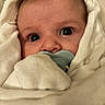baby, pacifier, blanket, closeup, face, infant, wrapped, soft, cute, child, newborn, skin, eyes, expression, warm, comfort, hooded, portrait, young, indoors