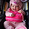 adorable, baby, boots, bunny_costume, car_seat, child, closeup, happy, hood, indoor, infant, infant_carrier, pink_clothing, plush, portrait, secured, sitting, smiling, toy, vehicle_interior