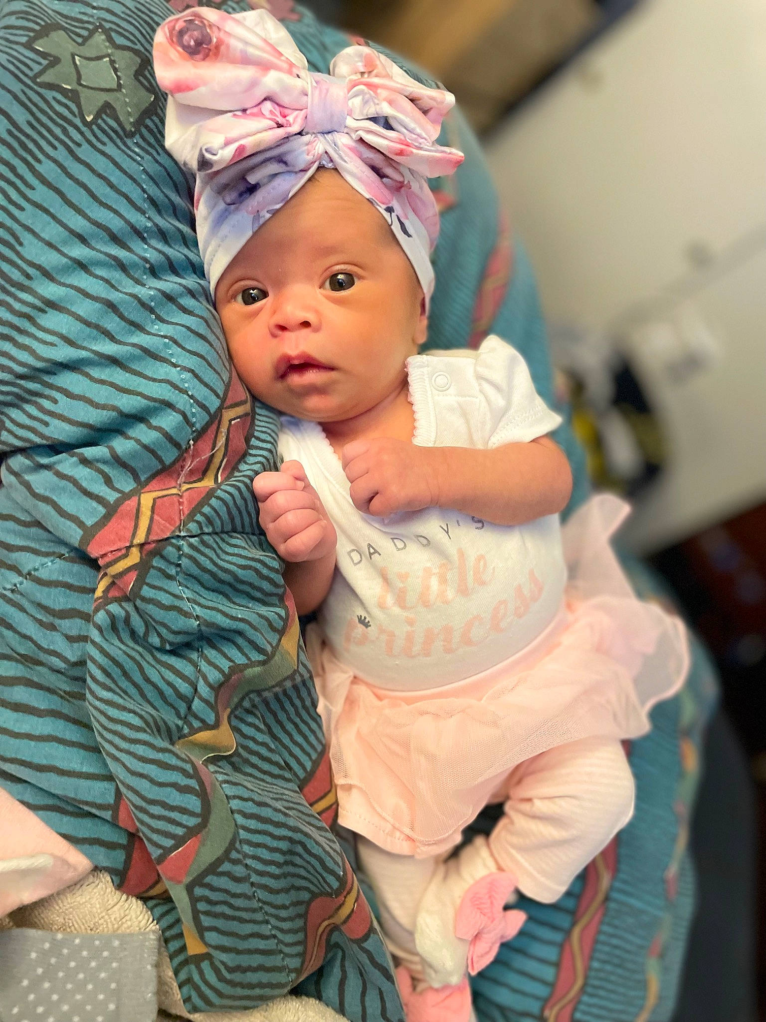 Naomi is registered to the contest to win money with this photo: baby, baby_products, baby_toddler_clothing, cap, cheek, child, costume_hat, event, eye, fashion_accessory, fun, happy, hat, headgear, headwear, knit_cap, magenta, person, pink, skin