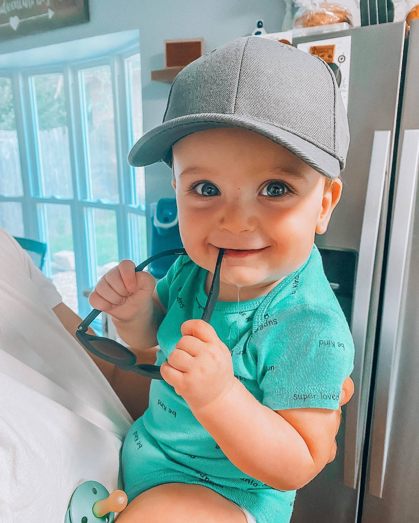 Franklin is registered to the contest to win money with this photo: baby, birth, child, finger, hand, headgear, headwear, hospital, joy, medical_equipment, person, room, service, toddler