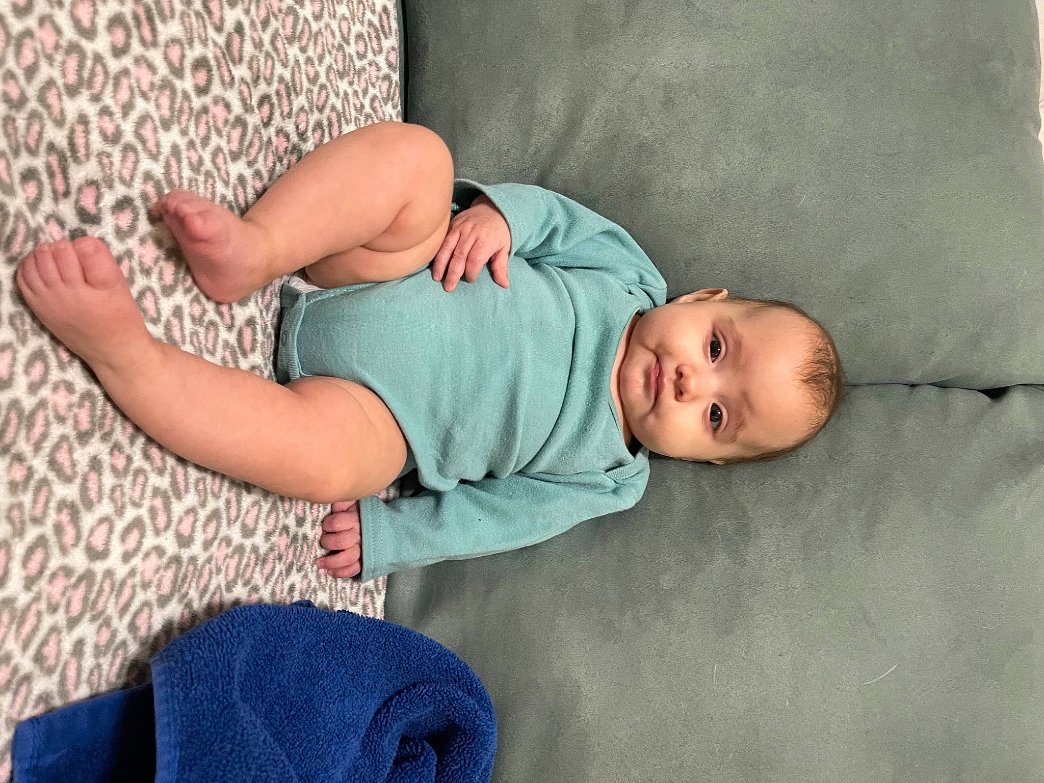 Isabella is registered to the contest to win money with this photo: arm, baby, baby_sleeping, baby_toddler_clothing, child, comfort, finger, grey, human_body, human_leg, knee, leg, pattern, person, skin, sleeve, t_shirt, textile, thigh, toddler