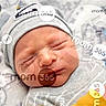 Zayne joined the competition — help win amazing prizes! newborn, baby, sleeping, infant, portrait, close_up, face, gray_hat, swaddled, blanket, cozy, indoors, peaceful, eyes_closed, nose, cheeks, headshot, soft_lighting, watermark, photography