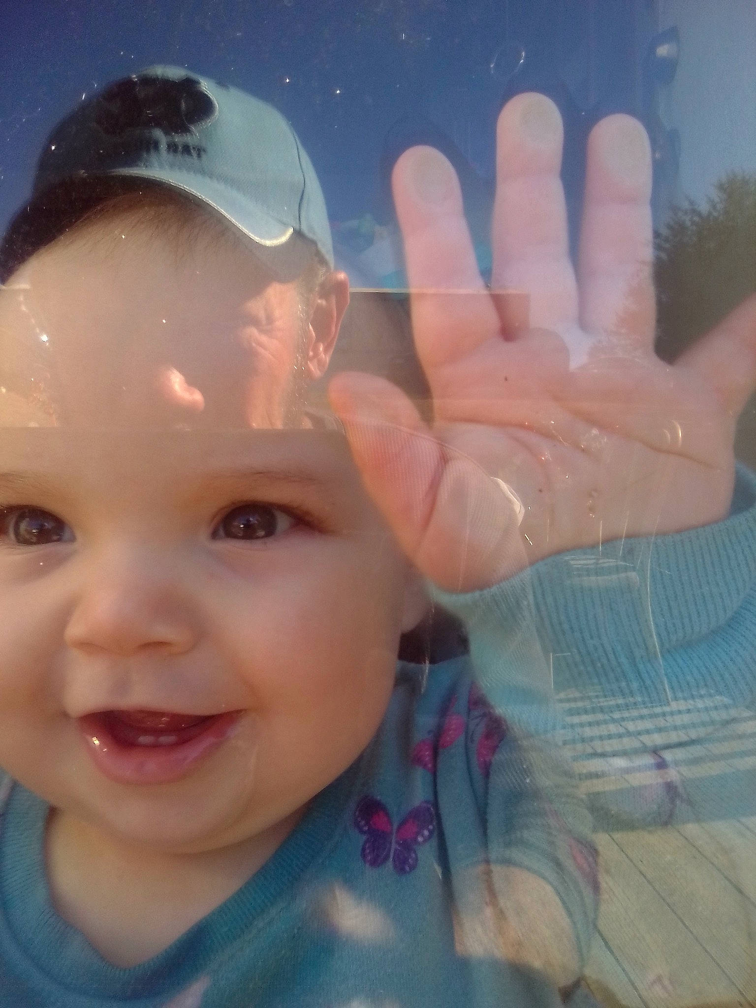 Kylie is registered to the contest to win money with this photo: azure, baby_toddler_clothing, cheek, chin, cool, facial_expression, finger, fun, gesture, hand, happy, head, human, human_body, lip, muscle, nose, person, pink, skin