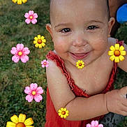 Karter is registered to the contest to win money with this photo: toddler, child, smiling, wet_hair, red_outfit, grass, outdoor, barefoot, happy, playful, flower_emojis, cute, portrait, summer, nature, skin, baby, person, fun, joyful