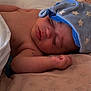 Lyandro Martinez participe au concours pour gagner de l'argent avec cette photo : baby, sleeping, bed, blanket, hat, blue, stars, face, arm, skin, pillow, comfort, peaceful, indoors, child, nap, cute, soft, rest, cozy