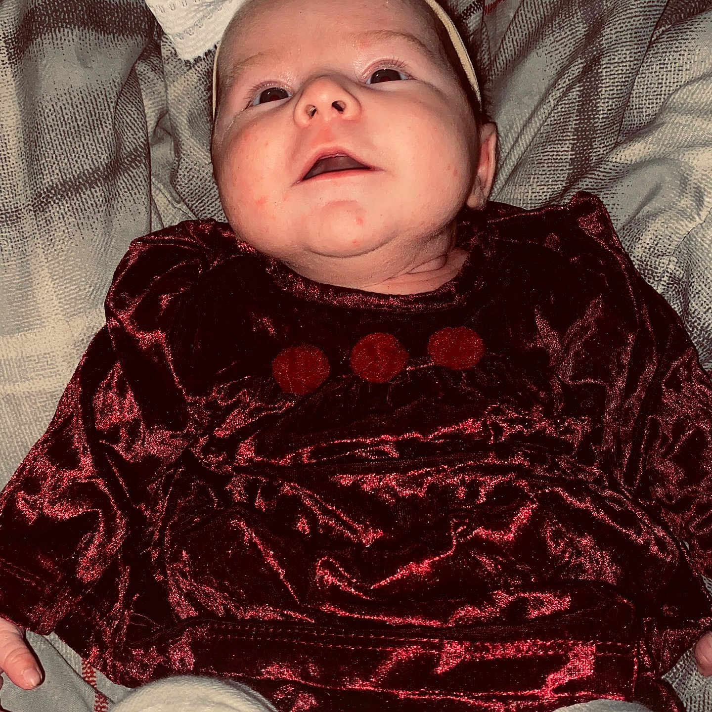 Addilynne is registered to the contest to win money with this photo: baby, blanket, clothing, couch, cushion, dress, face, furniture, head, homedecor, newborn, pants, person, photography, portrait, purple, quilt, sleeping, t_shirt, velvet