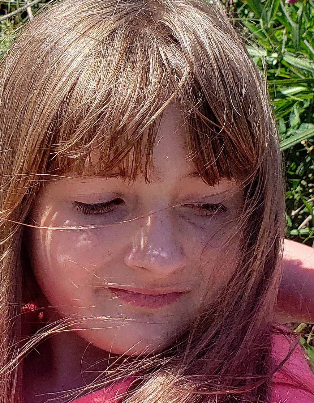 Ariel is registered to the contest to win money with this photo: bangs, blond, brown_hair, chin, close_up, eyelash, fun, grass, happy, hime_cut, human_body, jaw, layered_hair, lip, nose, people_in_nature, person, step_cutting, surfer_hair, toddler