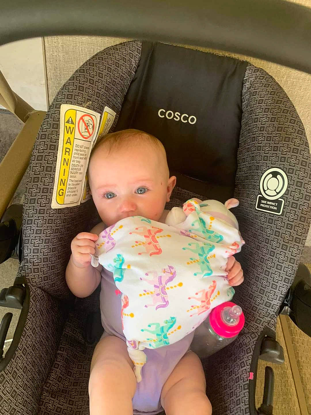 Miley joined the competition — help win amazing prizes! auto_part, baby, baby_carriage, baby_products, baby_sleeping, baby_toddler_clothing, bag, car_seat, car_seat_cover, child, comfort, family_car, lap, person, product, sitting, stuffed_toy, thigh, toddler, toy