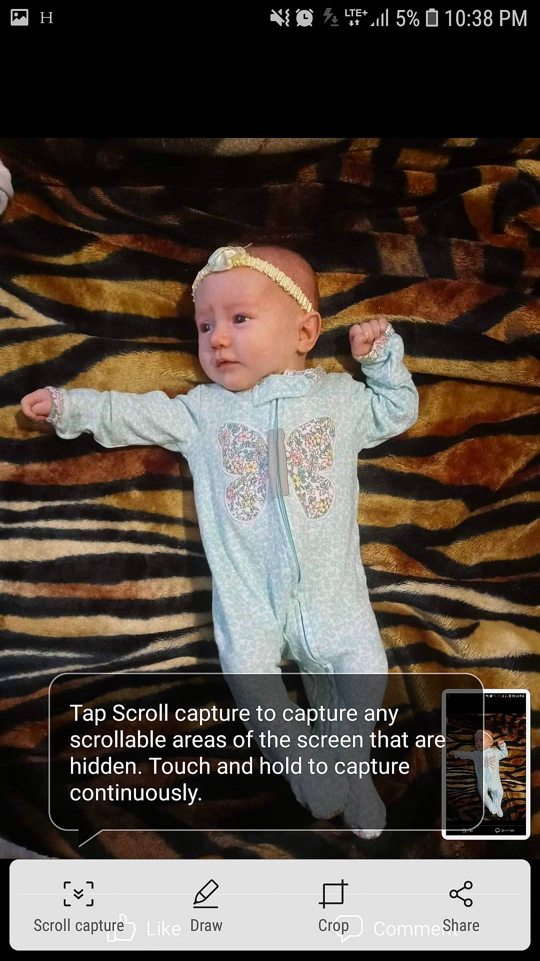 Miley is registered to the contest to win money with this photo: advertising, baby, baby_toddler_clothing, child, entertainment, event, flash_photography, font, fun, happy, headwear, person, photo_caption, portrait_photography, sleeve, t_shirt, toddler