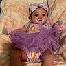 baby, pacifier, purple_tutu, headband, blanket, socks, infant, cute, soft_texture, indoor, child, clothing, lying_down, baby_girl, cozy, smiling_eyes, plush, comfortable, portrait, adorable