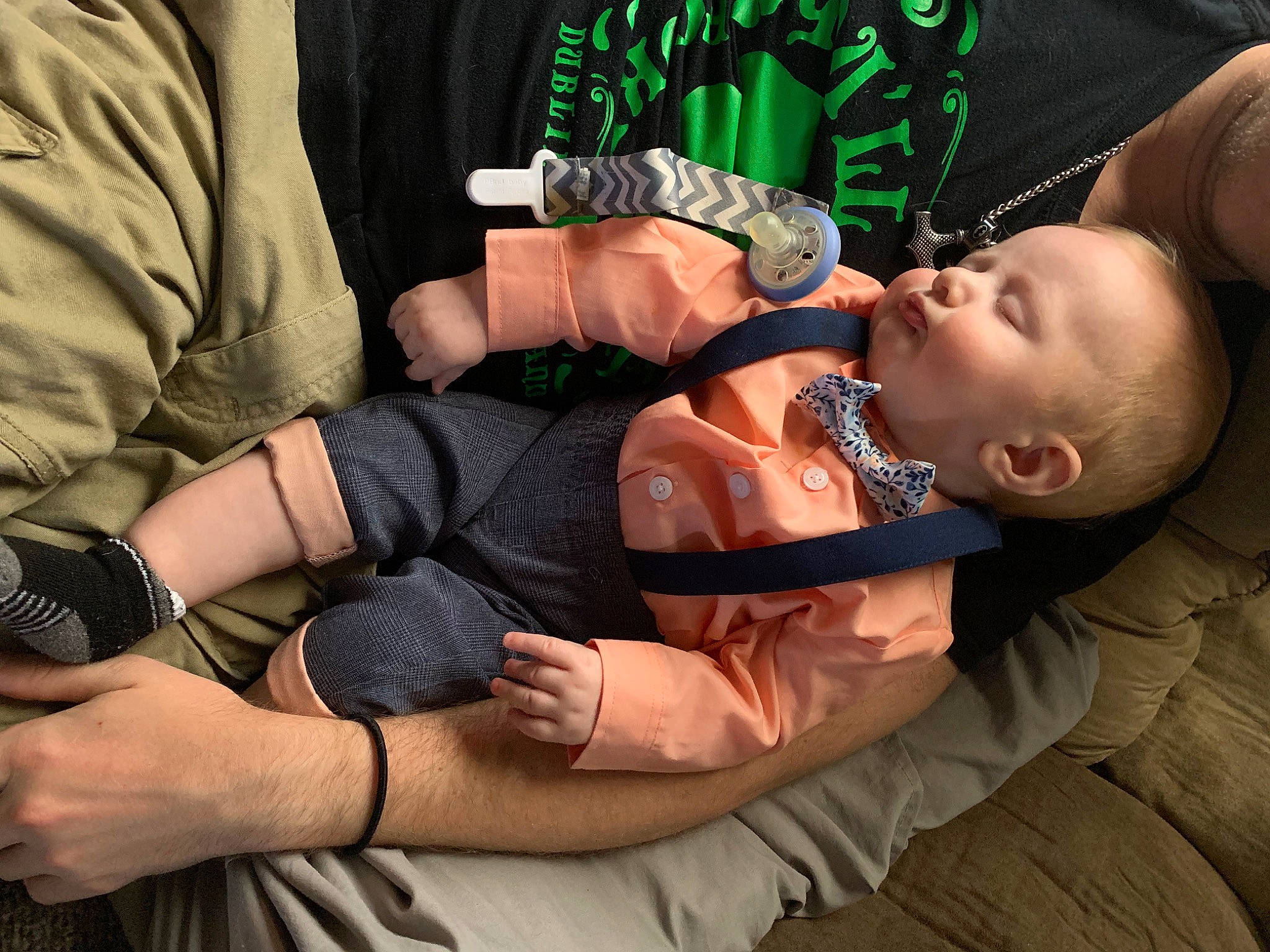 Caius is registered to the contest to win money with this photo: baby, baby_products, clothing, comfort, elbow, event, finger, gesture, glasses, hand, human_leg, joint, knee, leg, nail, person, sitting, thigh, thumb, toddler