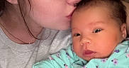 Oaklynn is registered to the contest to win money with this photo: affection, baby, child, closeup, clothing, cute, face, family, holding, indoor, infant, kiss, love, newborn, person, portrait, skin, sleepy, tender, woman