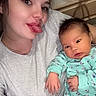 Oaklynn joined the competition — help win amazing prizes! baby, casual_clothing, child, cute, expression, face, family, floral_pattern, happy, head, indoor, mint_green, person, playful, portrait, seated, selfie, skin, tongue_out, woman