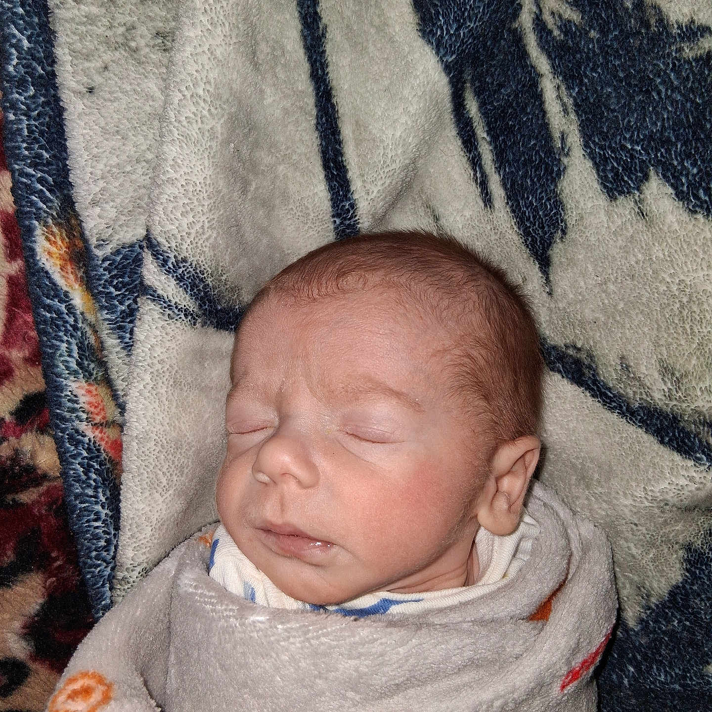 Adam joined the competition — help win amazing prizes! baby, blanket, child, closeup, cozy, cute, face, head, indoors, infant, newborn, peaceful, portrait, resting, skin, sleeping, soft_texture, toddler, wrapped, young