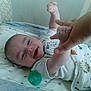 Royce joined the competition — help win amazing prizes! adult_hand, baby, baby_boy, bed, blanket, closeup, clothing, comfort, crib, cuddle, hand, happy, infant, interaction, lying_down, pacifier, parent, pattern, skin, smile