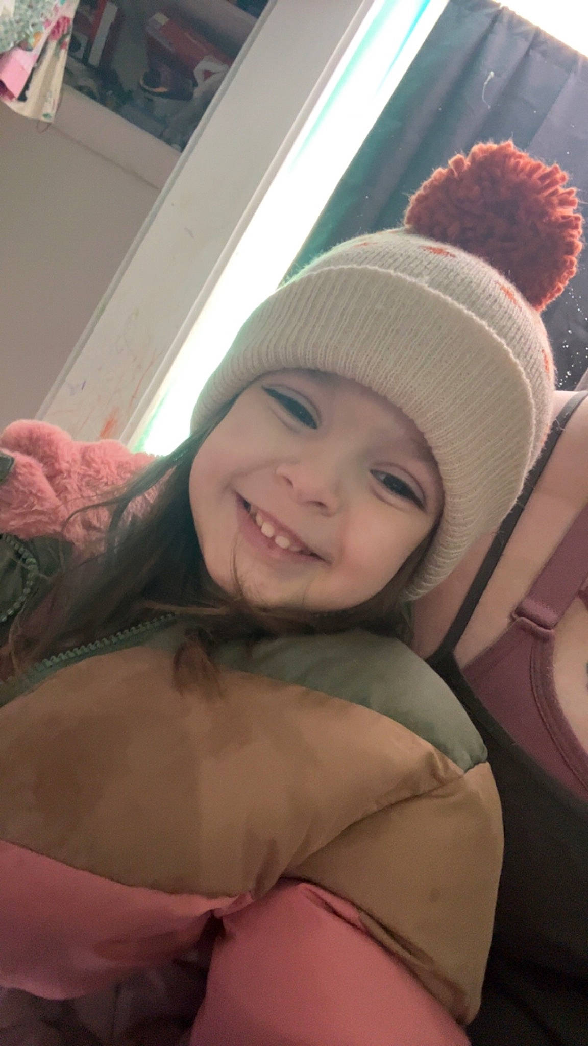 Winry is registered to the contest to win money with this photo: arm, cap, comfort, cool, eye, eyebrow, eyelash, face, hairstyle, happy, headwear, human_body, joy, leg, lip, mammal, mouth, neck, person, shoulder