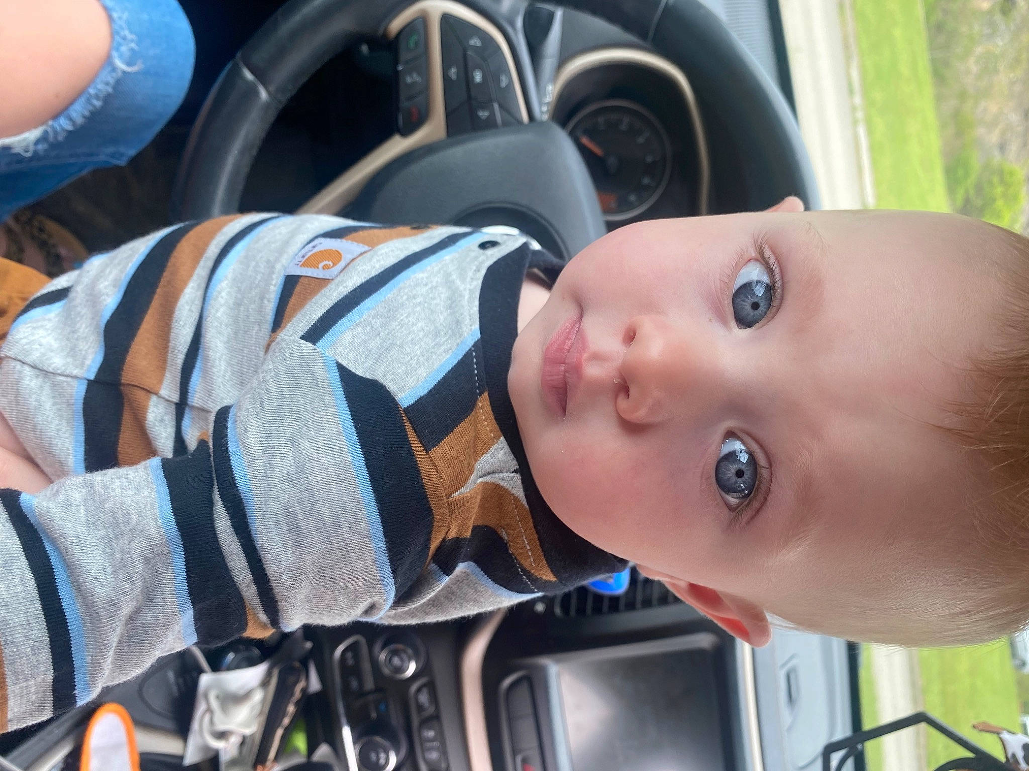 Hunter joined the competition — help win amazing prizes! auto_part, automotive_wheel_system, baby, baby_products, car, car_seat, car_seat_cover, child, electric_blue, grass, motor_vehicle, nose, person, plant, steering_wheel, toddler, tree, vehicle_door, wheel, white