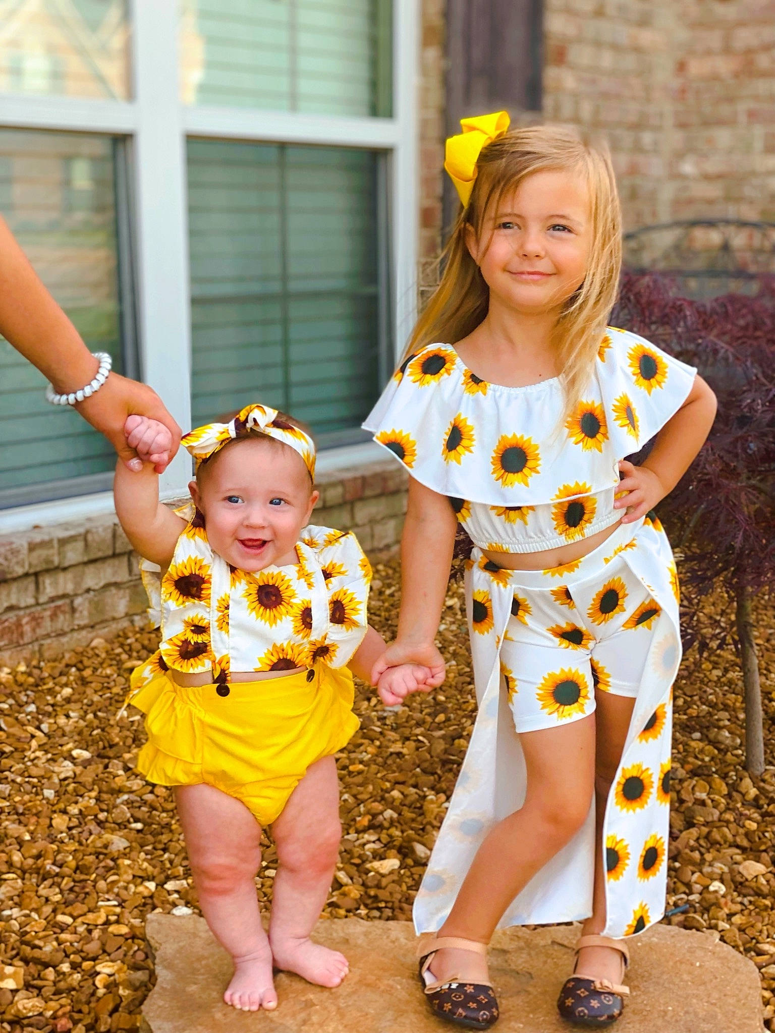 Jessi is registered to the contest to win money with this photo: baby_toddler_clothing, beauty, child, event, face, facial_expression, fun, grass, happy, joy, leg, leisure, orange, people_in_nature, person, photograph, plant, playing_with_kids, recreation, smile