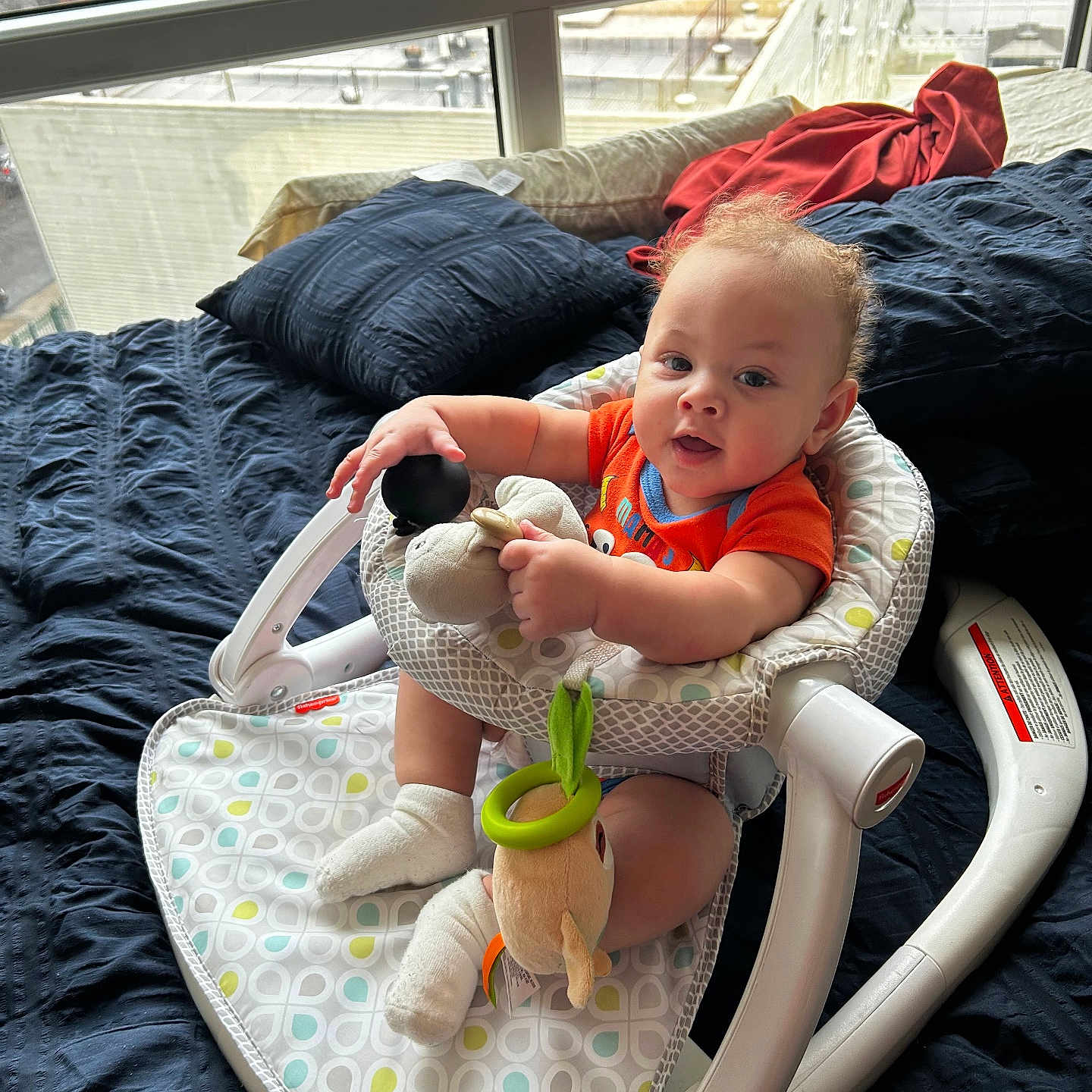 Tymell joined the competition — help win amazing prizes! baby, bed, bedroom, clothing, couch, crib, cushion, face, furniture, head, homedecor, hosiery, indoors, infantbed, person, photography, portrait, sitting, sock, t_shirt