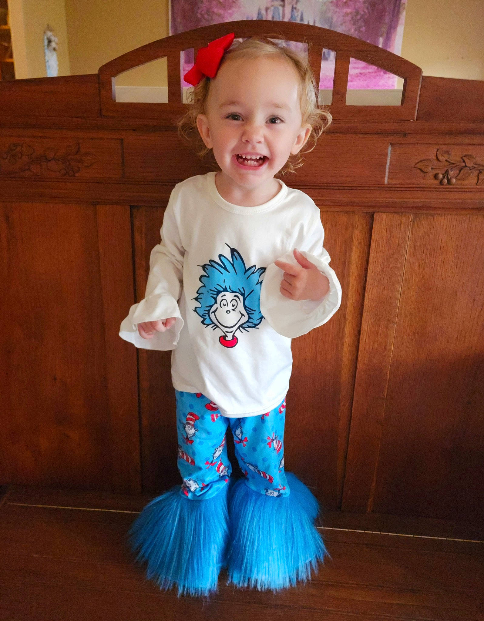 Vivi joined the competition — help win amazing prizes! baby_toddler_clothing, cabinetry, child, face, facial_expression, fun, hair, hairstyle, happy, head, jeans, joy, organ, person, pink, shoulder, sleeve, smile, standing, t_shirt