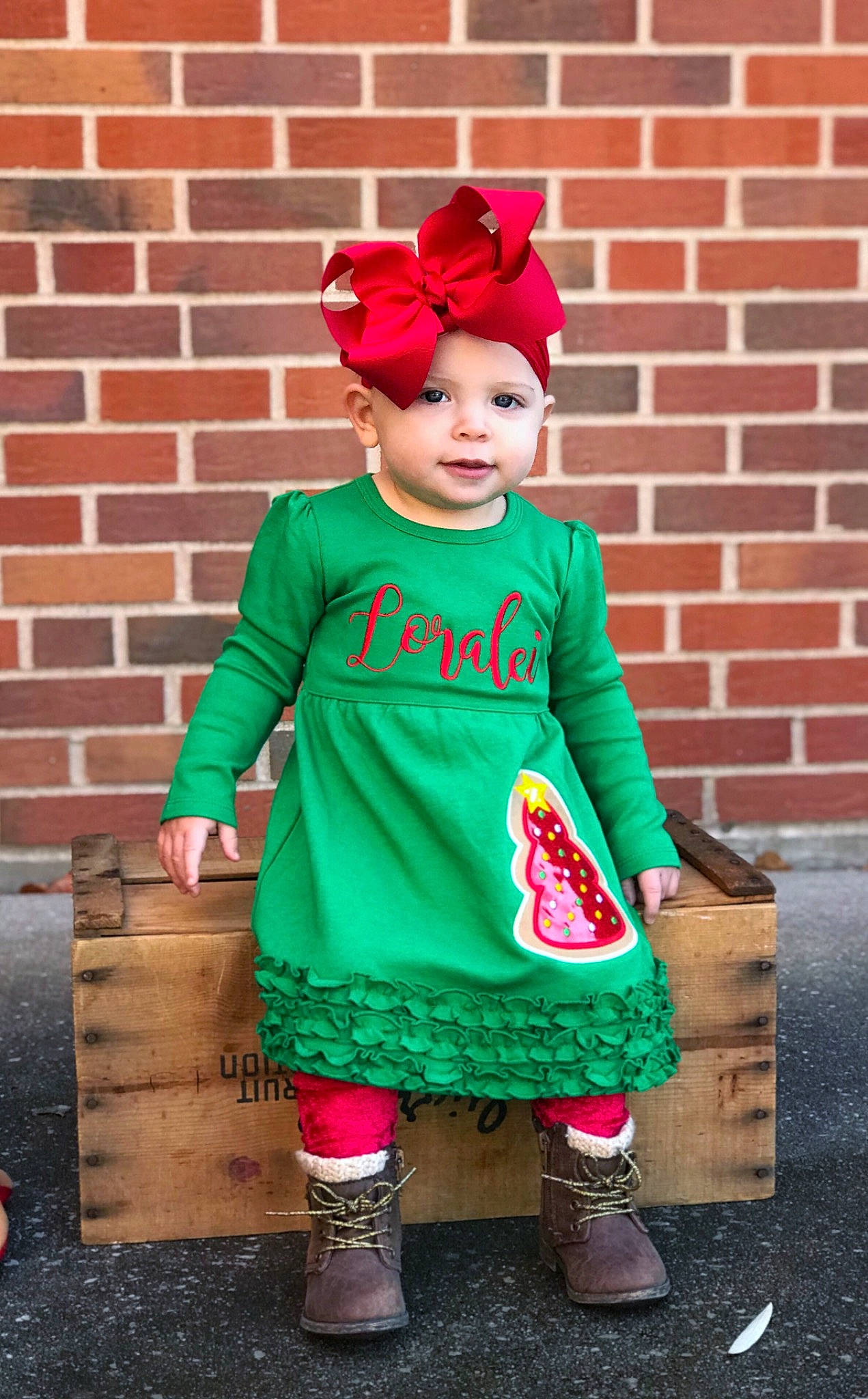 Loralei is registered to the contest to win money with this photo: baby_toddler_clothing, child, child_model, clothing, costume, dress, fashion_accessory, green, holiday, magenta, outerwear, pattern, person, pink, red, sleeve, t_shirt, textile, toddler